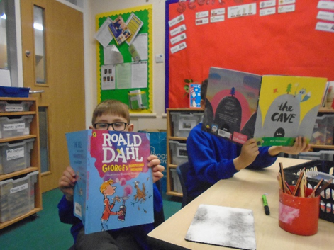 Boys reading Hazel class Boys reading
