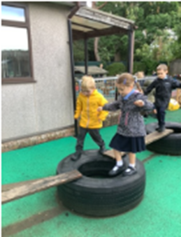 children on adventure course