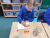 Image of pupil completing puzzle