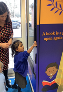 image of pupil using book vending machine