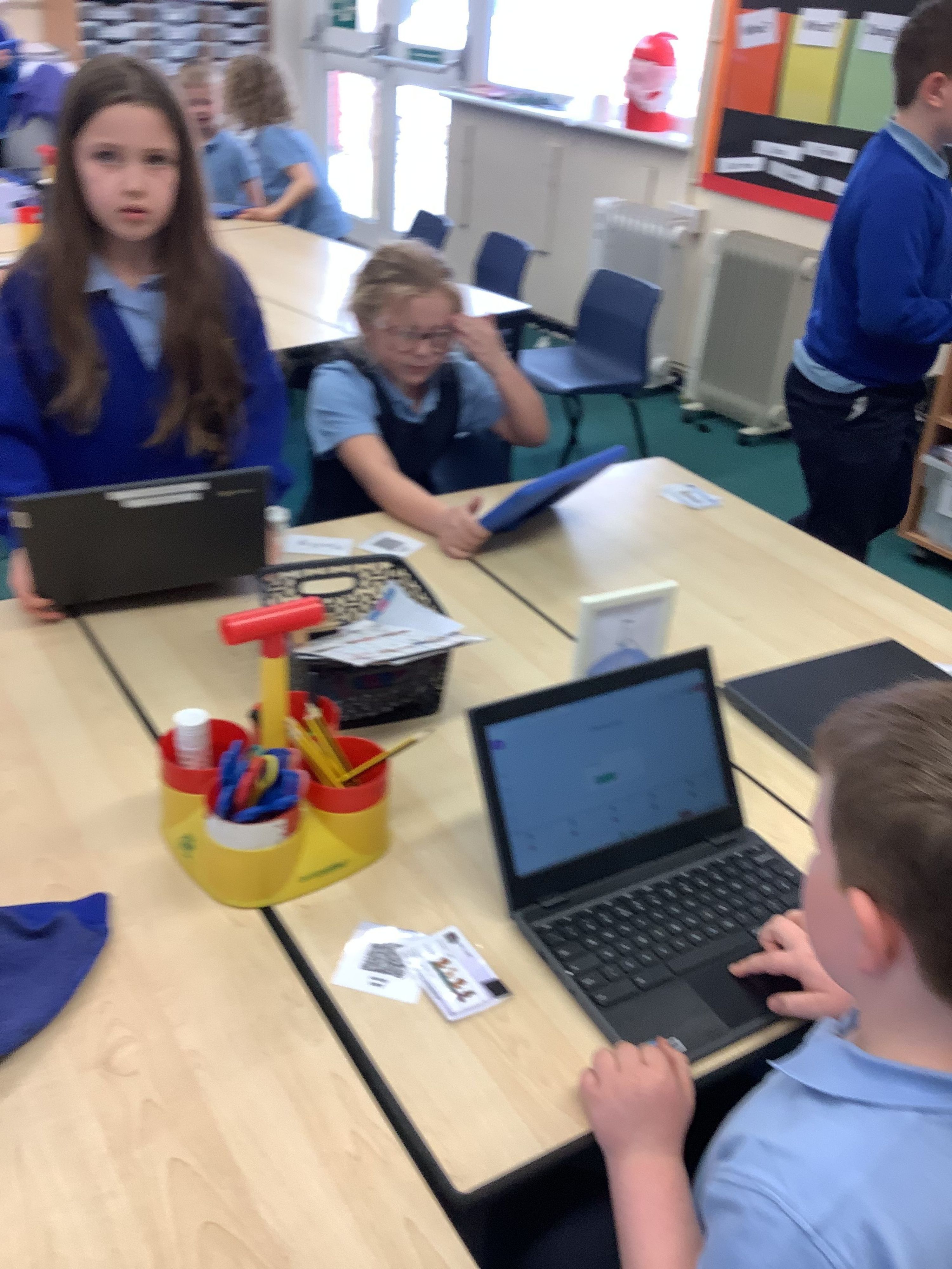 image of children using laptop computers